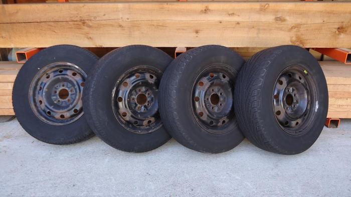 Four All-Season Tires on Rims - 215/70R15