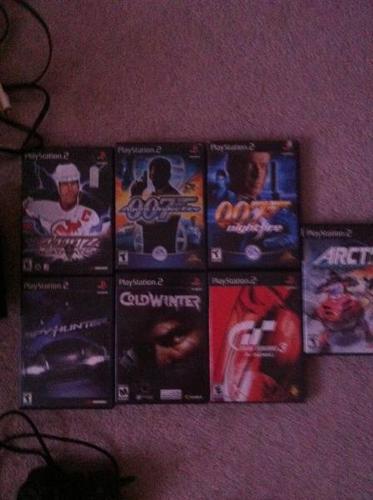 Playstation 2 With 7 Games & 2 Controllers