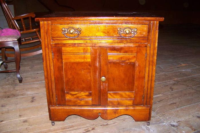 two antique cabinets