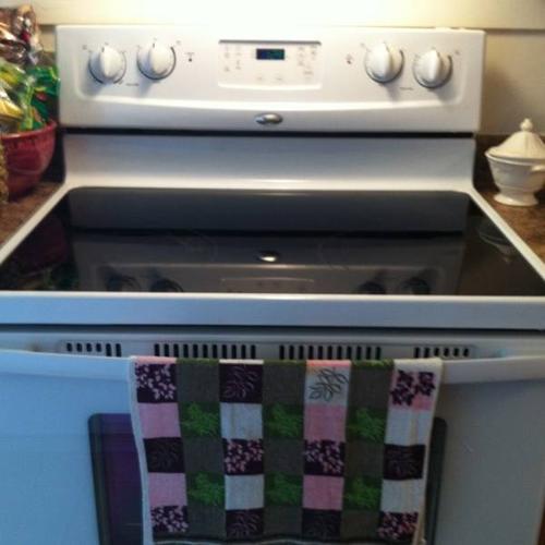 White and black whirlpool flat top stove/oven