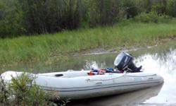 This is an 11' Aquamarine inflatable (heavy duty PVC) boat with a removable aluminum floor. Also includes folding aluminum wheels for easier transport.
You can put this boat together in about 15-20 minutes with a decent air compressor to pump it up. It's