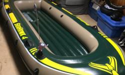 Intex Seahawk 4 inflatable boat in excellent condition. Comes packed in a plastic tote bin with kicker bracket, rod holders, oars and air pump. I'm also including a really cool old Ted Williams electric trolling motor that works great, just add a battery