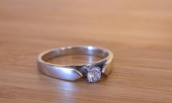 1 year old 14K diamond solitare ring for sale. Asking $350 OBO. From an ex ex boyfriend;)