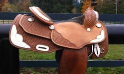 Silver Supreme with Bob Marcellus tree, 15.5" seat, FQHB, gorgeous saddle in excellent condition. First $1200 takes it! Contact Tami.