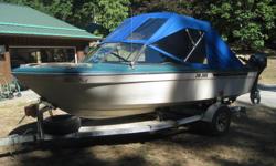 Full Canvass, 115 HP Mariner, Trailer, VHF, GPS/Depth Sounder, Built in tank plus 5 gal spare tank. Assorted fishing and safety equipment.