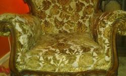 Set includes couch/ chesterfield and two chairs. Very beautiful carved mahogany details and brown floral pattern (not the tacky floral). would go good with oranges, browns, greens, reds and yellows.
Couch is at least 6ft, would look nice with new fabric