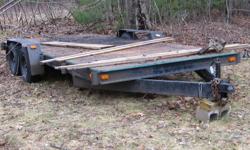 Steel trailer 18' x 7' deck. Two mobile home axles. Good shape. No papers.
$1200.00 obo. May trade.