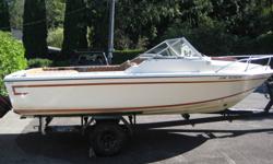 4 cylinder, 120hp inboard outboard.  Runs very well and an excellent fishing or pleasure boat.  Used only in fresh water lake.  Second owner for the last 23 years.  Docked in a boat house for summer, garage stored and winterized.  Minimal sun & waterline