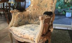 Louis Quinze Fauteuil (or Bergere), original horsehair stuffing, and remnants of toile fabric. Needs restoration. Beautifully carved, cabriole legs, remnants of gilt and paint.