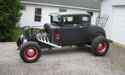 1930 Ford Model A Coupe.   All steel.   3 Inch Chop roof.   Ford 351.   360 h.p. SVO Crate Engine.   C-6 Automatic.   9" Rear end.  Drives straight and true.   Extra parts included.   $ 30,000 inspected.   519-426-8565.  Leave message (Simcoe,Ont).