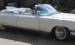 1959 Cadilac Eldorado 2dr convertable (white with white), no clue as to miles but was forced to fill in the blanc, was running / driving 20 years ago when parked but has been sitting out in the ellements since then, no rag left, needs total resto, all