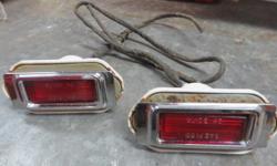 Original side marker lights with sockets & pigtails for 1968 Chevrolet Chevelle, Malibu, El Camino. May fit other years & models. Driver quality. See photos.