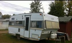 1970 travelaire travel trailer. Has a working fridge stove oven and furnace toilet and holding tank were removed for more storage Sleeps 5. Table and couch fold down into beds and has a upper bunk above couch. No leaks pulls good with a ford ranger
This