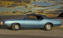 Make
Oldsmobile
Model
Cutlass Supreme
Year
1971
Colour
blue
kms
172000
Trans
Automatic
1971 Oldsmobile Cutlass Supreme Convertible FOR SALE
This vehicle is an original, number matching vehicle , repainted in its original Viking Blue. restored over a nine
