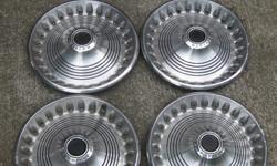 set of 4 14"wheel covers off a 73 barracuda
small scuffs and dings