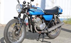 1973 Kawasaki S2A
-Fast and fantastic handling for a early '70's machine.
-No major modifications.
-Turns heads and starts conversations anywhere as is.
-Full of two stroke quirks but has been totally reliable.
-1,200ks since total engine rebuild