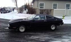 Current pictures to come 1977 Mustang II, Black. Was hit in the snow. Needs front driver side spindle, fender, and driver door. Motor is a 1983 302, Weind intake on a 700cfm Edlebrock 4 barrel. Msd Ignition, billet distributor, AL6 Ignition box, 4 core