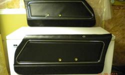 brand new black door panels still in the plastic shipping bag . cost 600.00 landed on door step  asking 400.00 O.B.O.