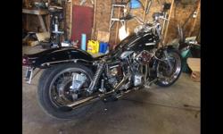80 cui shovelhead
Super B carb
Motor built by previous owner
Aftermarket cam
Hydraulic lifters
New seats
Wide glide tanks
Lowered
Bobbed back and front fender
Forward foot controls
New handlebars
New battery
Chrome swing arm and chain guard
4 boxes of