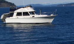 "Twilight 1" was built in 1983 by Permaglass Construction in Richmond BC. It is a 32 foot Command Bridge Sedan Cruiser.
Boat is currently moored at the Capital City Yacht Club in Sidney BC. Since purchased the boat has been boat house kept.
OVERALL LENGTH