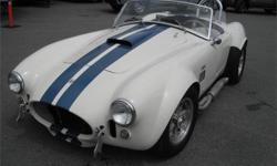 Make
Ford
Year
1993
Colour
White & Blue
Trans
Manual
kms
12397
Stock #: BC0027474
VIN: BCS7556220293
1993 Ford AC Cobra Convertible Replica, 8 cylinder, Ford Cobra 351 engine. 2 door, manual, white & blue exterior, white interior, leather. $32,510.00 plus