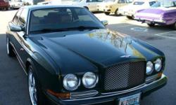 Make
Bentley
Colour
Green
Trans
Automatic
kms
85000
This one of a kind 2 Dr. Sedan Bentley Continental was a one off special custom fitted for ex Football Player Thomas Jones formally of the New York Jets.
Notice the custom elegant grill, and the side