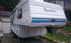 1997 Komfort 5th wheel. Good condition, a/c, two spare tires, two 30lb propane tanks, hot water on demand, separate freezer and fridge.
New hitch included. $5500