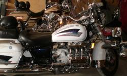 1997 HONDA VALKYRIE TOURING, CUSTOM MURALS, HARD BAGS, NEW TIRE, REAR BRAKES, RUNS EXCELLENT, WINDSHIELD, DRIVING LIGHTS, CHROME ACC. 2 BACK RESTS, RECENTLY CERTIFIED, DEALER CHECK OVER. REALLY NICE BIKE, LOTS OF POWER AND TORQUE, THESE BIKES GO FOR 2 -
