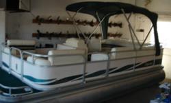 1998 21 Premiere pontoon,40HP Mercury,oil injected W/power trim,stereo,tilt wheel,docking lights,molded helm station W/cooler,plastic seat bottoms,bimini top,full custom cover,serviced,ONE OWNER,kept in covered hoist,very nice throughout,no trailer,we