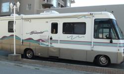 1998 Winnebago Itasca SUNRISER 32ft Class A Motor Home, Built on a Chevy 7.3L V8 Engine, With ONLY 21000MILES , Back up Camera & Navigation,Ceiling Fans, Central ducted air conditioning and Heathing System, SLEEPS 6/Rear Queen Bed, Fridge & Freezer,
