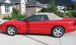 1999 Pontiac Firebird , Red exterior with beige interior Fully loaded a/c electric windows Alarm system 6 cylinder auto Summer driven Very good condition Has travel cover for convertible top, Car cover for storage also A must see We need the space Please