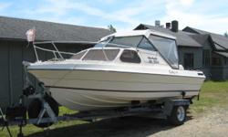 19 1/2 ft. Beachcraft boat with cuddy
Completely rebuilt 485 Merc inboard motor (Have all receipts)
Approx. 10 hours on new motor
Comes with aluminum trailer
Also comes with fully enclosed back canopy in excellent condition (not shown)