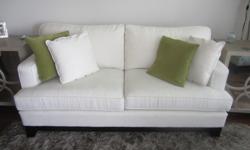 Only 1 year old! Custom Designed - Metro Studio Sofa/Couch - $1000 obo (Designer Fabric: Joanne Fabrics), includes pillows (x4) Dimensions = 75L 39D 37H. No stains. Leaving country and sad to sell. Email or phone to view and/or pick-up 1-604-805-2880