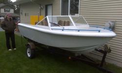 This 14.5 ft. fibreglass boat and trailer is showing her age but is still sound and seaworthy. Top-notch 50 HP Mercury engine, built in stereo, steering controls, fishfinder, ski pole, fuel tank and best of all, an extremely low price as the owner is very