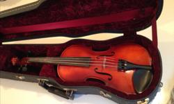 Roderich Paesold violin 1/2 size. Circa 1976 model 801. Includes a hard case. Bow need to be redone. Very good condition. $399 OBO
