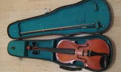 1/2 Violin made in China. In great condition. Including bow and case.