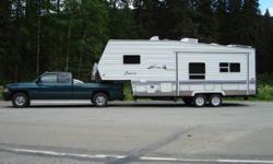 2002 5th wheel, Sierra model by Forrest river, it is 26' long, rear entry, 12' slide, mid kitchen, microwave, stove/oven, three way fridge, air conditioning, queen size bed,[north/south] tub/shower, and outside shower, sleeps six, tinted windows, with