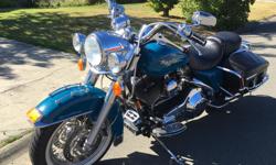 Beautiful Rare Teal Blue
2002 Road King for sale in Parksville. LOTS of upgrades, such as heads and top-end kit; cam set and 100 cu. in. bore; high compression pistons and release; oil cooler - stainless braided lines; diamondback hydraulic clutch; Kerker
