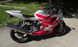 2002 Red and Silver Honda CBR F4i
Excellent condition
26989 kms
600 cc
New chain and sprocket
Carbon fiber look windshield pin stripe on wheeles
I have had it for 3 seasons works great reason for selling too many toys not enough time it just needs a