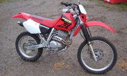 Honda XR250 looks and runs great, no mods all stock. Ready for the trail. Make me a reasonable offer, has to go. No trades please!