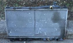 1.7L automatic radiator, works good, fits other years
