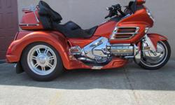 2003 GL1800 Goldwing Trike
This trike has only 48,000 kms. Very nice looking trike in the very popular Honda Burnt Orange with walnut fascia,
FINANCING AVAILABLE FOR QUALIFIED BUYERS
