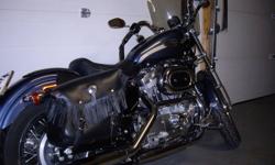 100th Anniversary 883 Hugger: - Excellent Condition
Gun Metal Blue
Extra's:
Windshield, Forward Controls, Engine Guard/Crash Bar, Flame - Grips & Gas Cap, Leather Saddle Bags, Chrome License Plate Holder
PH: 250.442.3411