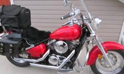 2003 800 Kawaski Vulcan Classic. This bike is MINT, w/ custom candy apple red paint job. Also Jardine pipes (and original pipes) saddle bags, back rest, Memphis shade windshield and lowers , Kuryakyn Floor boards,after market engine  guards and back rest.