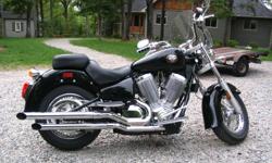 2003 Victory V92C
Great bike with lots of power
c/w mustang seat with rider backrest, windshield, aftermarket grips, slash cut exhaust, hard bags and back rest