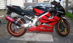 2004 red and black CBR 600 f4I
26,000 km
FULL MICRON EXHAUST SYSTEM with red and black anodized canister.
Power commander
Smoked windscreen
Frame sliders
New rear tire (Bridgestone Battleax BT014R)
Semi synthetic Honda oil.
Also included is the original