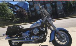 2004 Yamaha XVS 650 V-Star Cruiser * Low kilometres! * $4299
A very rare two tone blue colour. This bike has been in storage since 2008. Very low kilometers. Ready to ride. Full service, carb clean and rebuild, new battery.
Equipped with Roadkrome bags,