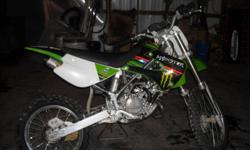 selling my kx100. runs great, starts first kick. rebuilt the engine last year. NEVER been raced only trail ridden. Very fast. has monster team graphics. has FMF power core 2 slip-on exhaust. also comes with brand new spare back tire. i would like the