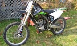 2005 Kawasaki KX 250F four stroke for sale. Never raced, just trail ridden. Regular oil changes and maintenance done (stainless steel re-useable oil filter, 1.5 L of extra kawasaki oil). Just went in for a tune up. Four new valves and springs (intake and
