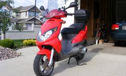 High quality Spanish scooter, 4-stroke 150cc, runs great, good condition, always garage stored, will do about 105km/h, almost-new Michelin tires, top-box, windshield, loud aftermarket horn, asking $2000.